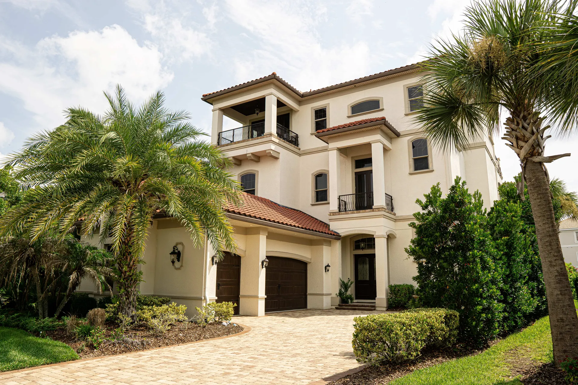 Custom Florida home exterior with traditional architectural details