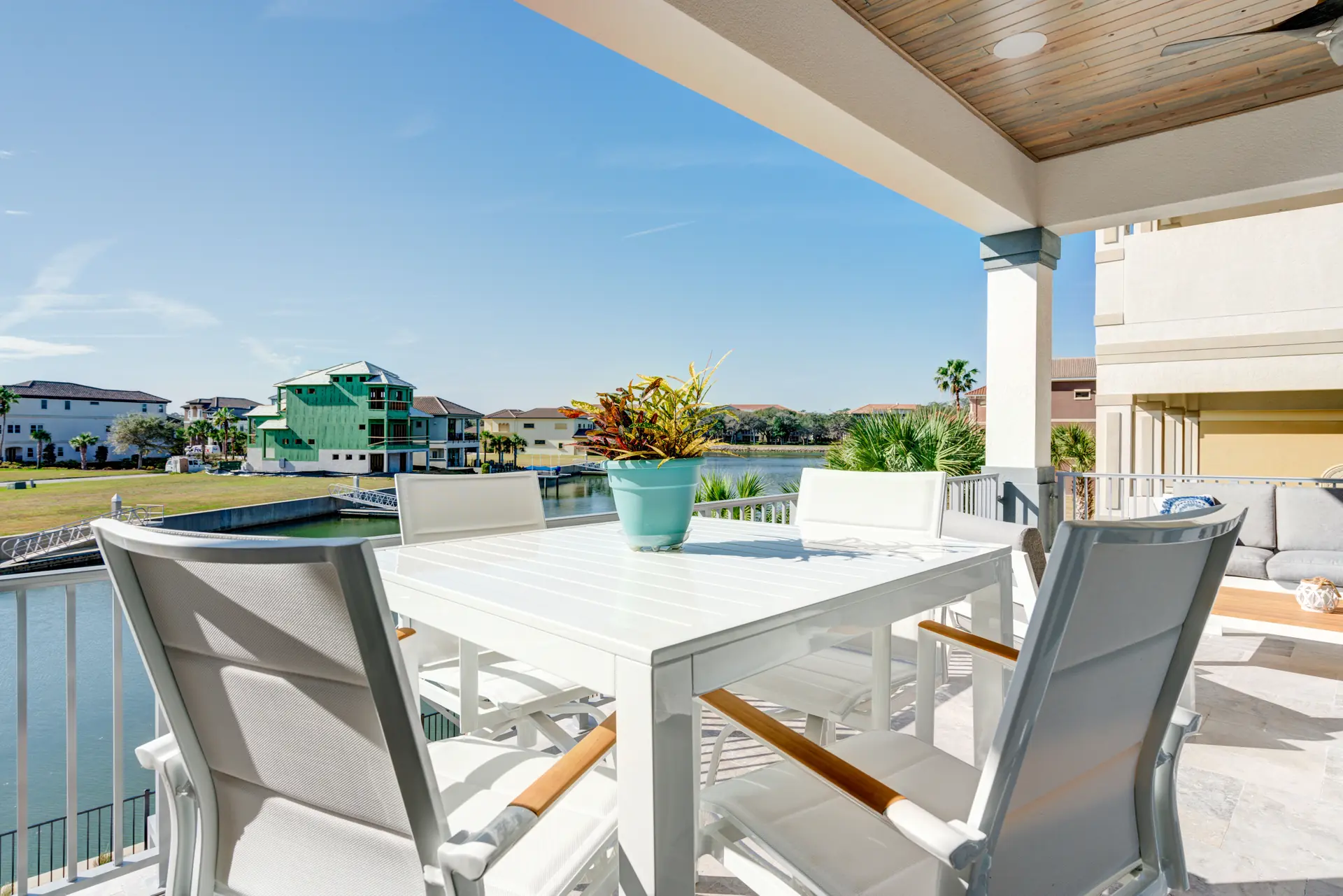 Covered waterfront terrace designed for outdoor dining