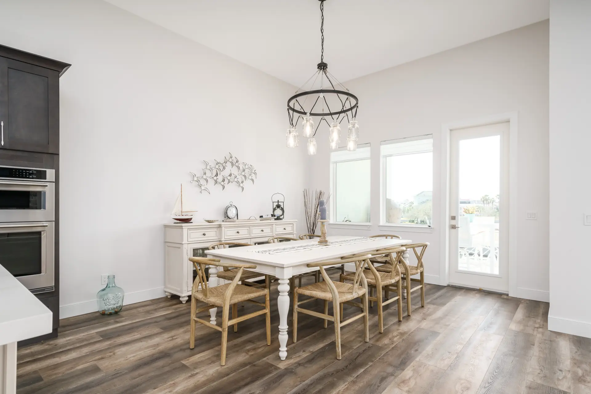 Bright dining room connected to a custom kitchen