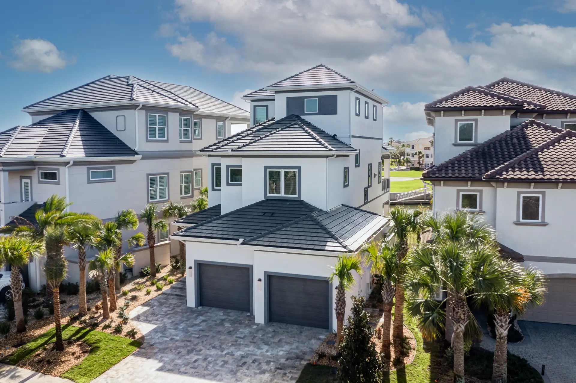 Aerial view of a three-story custom waterfront residence