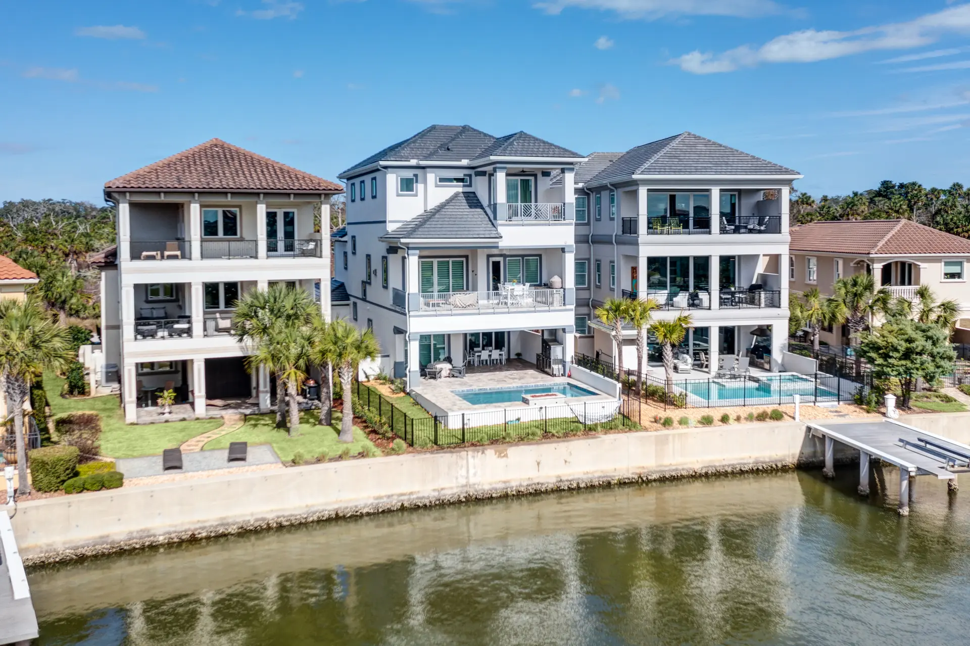 Waterfront luxury residence viewed from across the canal