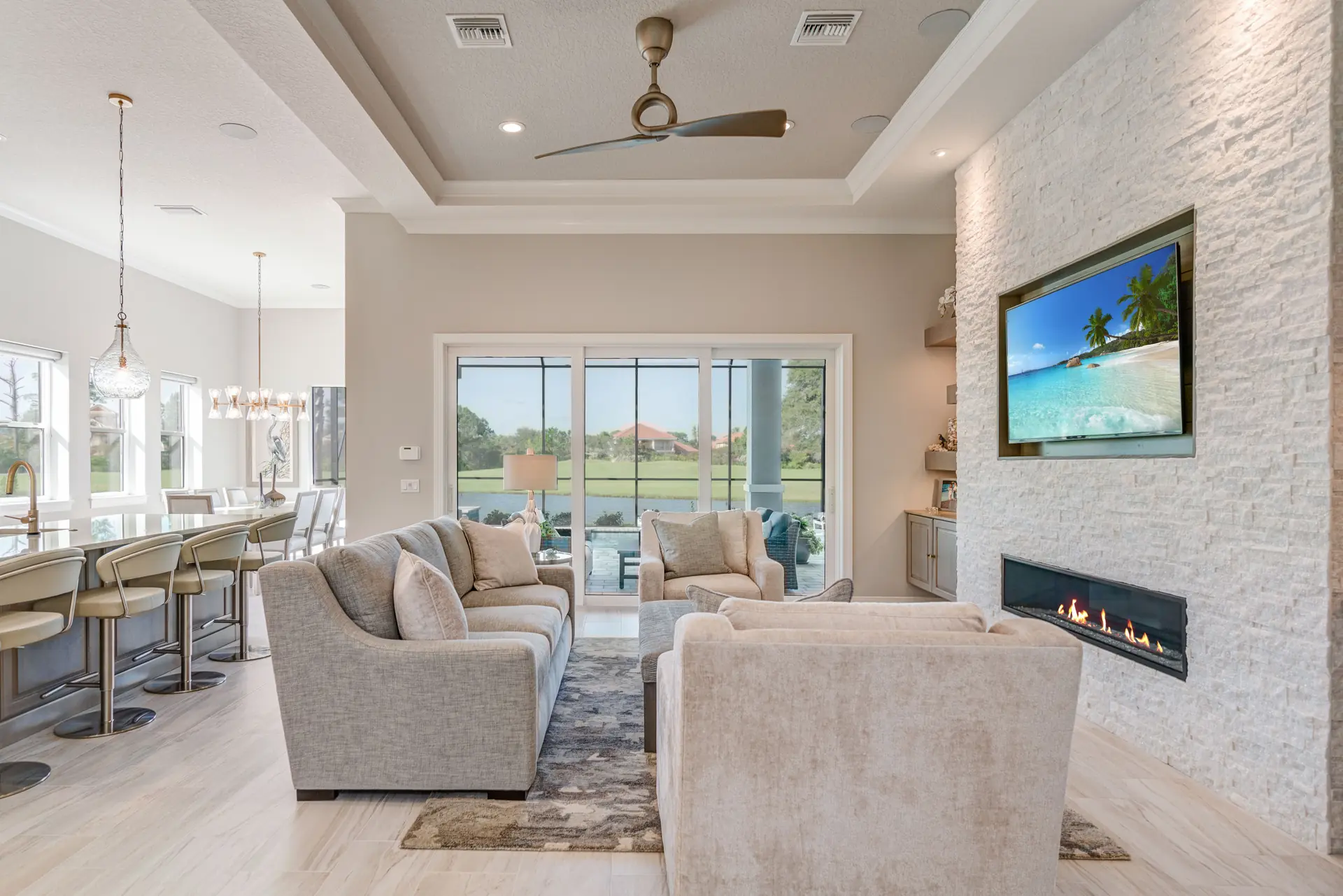 Tailored living room with layered lighting and lake views