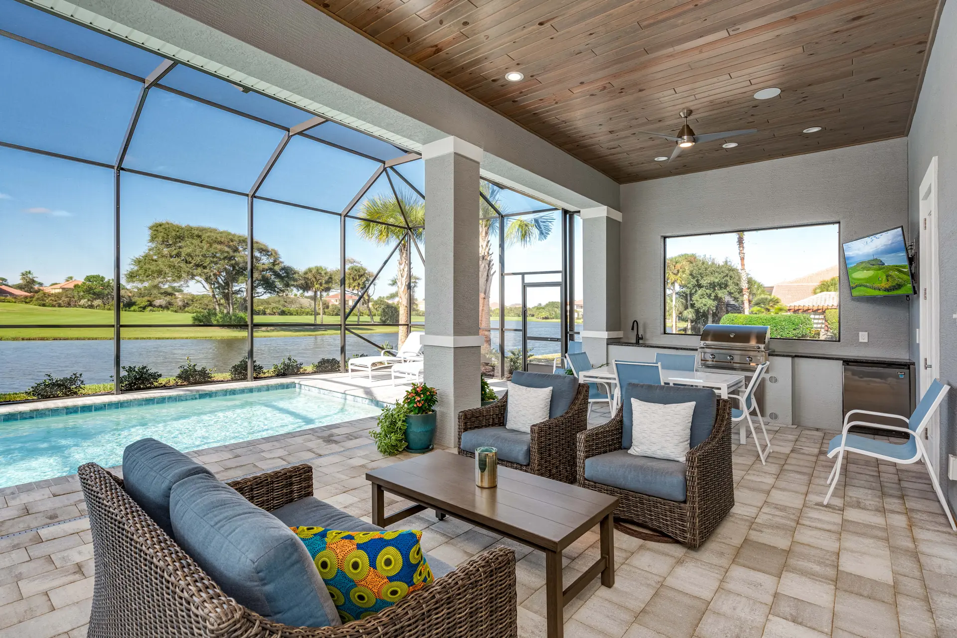 Furnished screened lanai overlooking a Florida lake