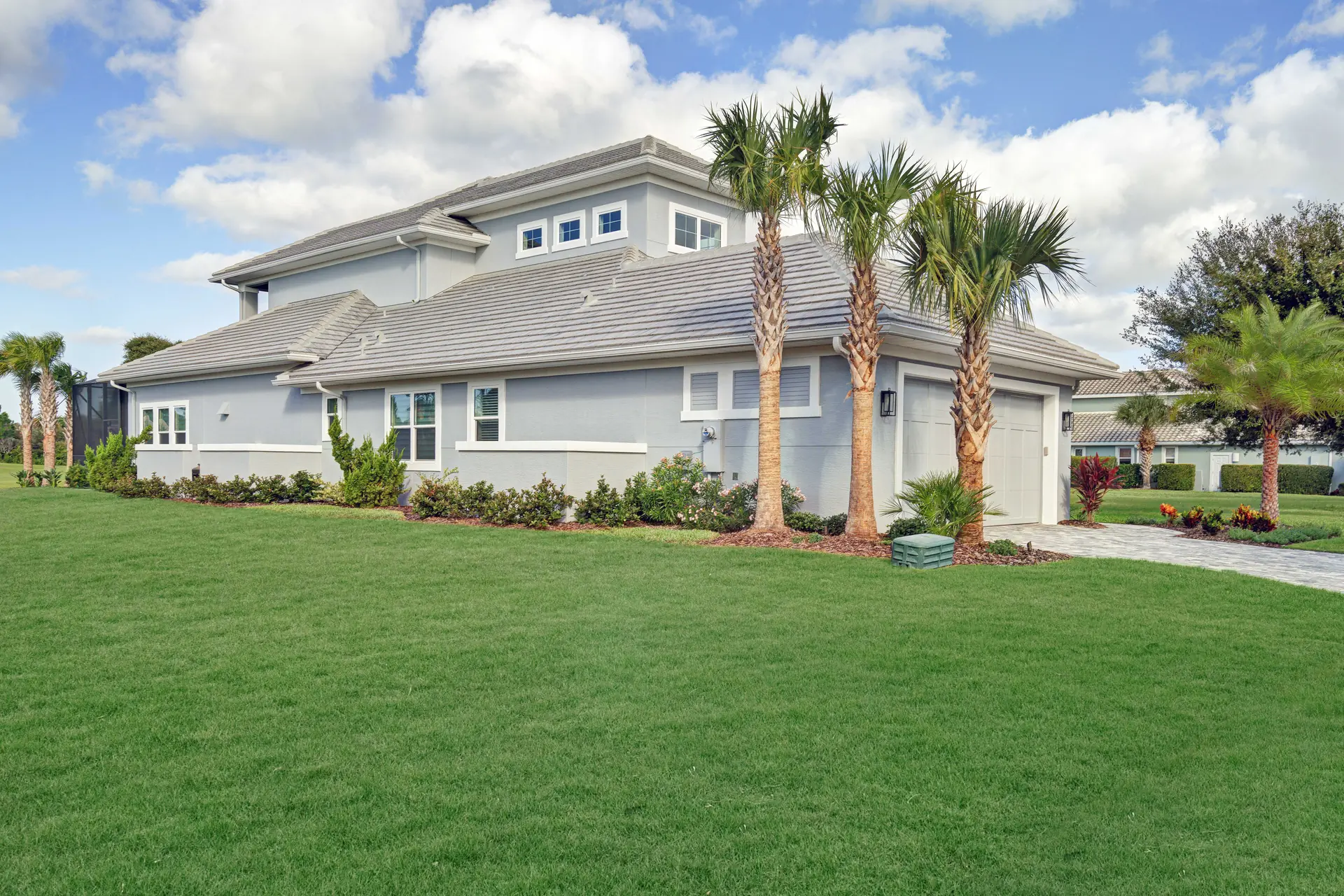 Side and rear elevation opening to an expansive lawn